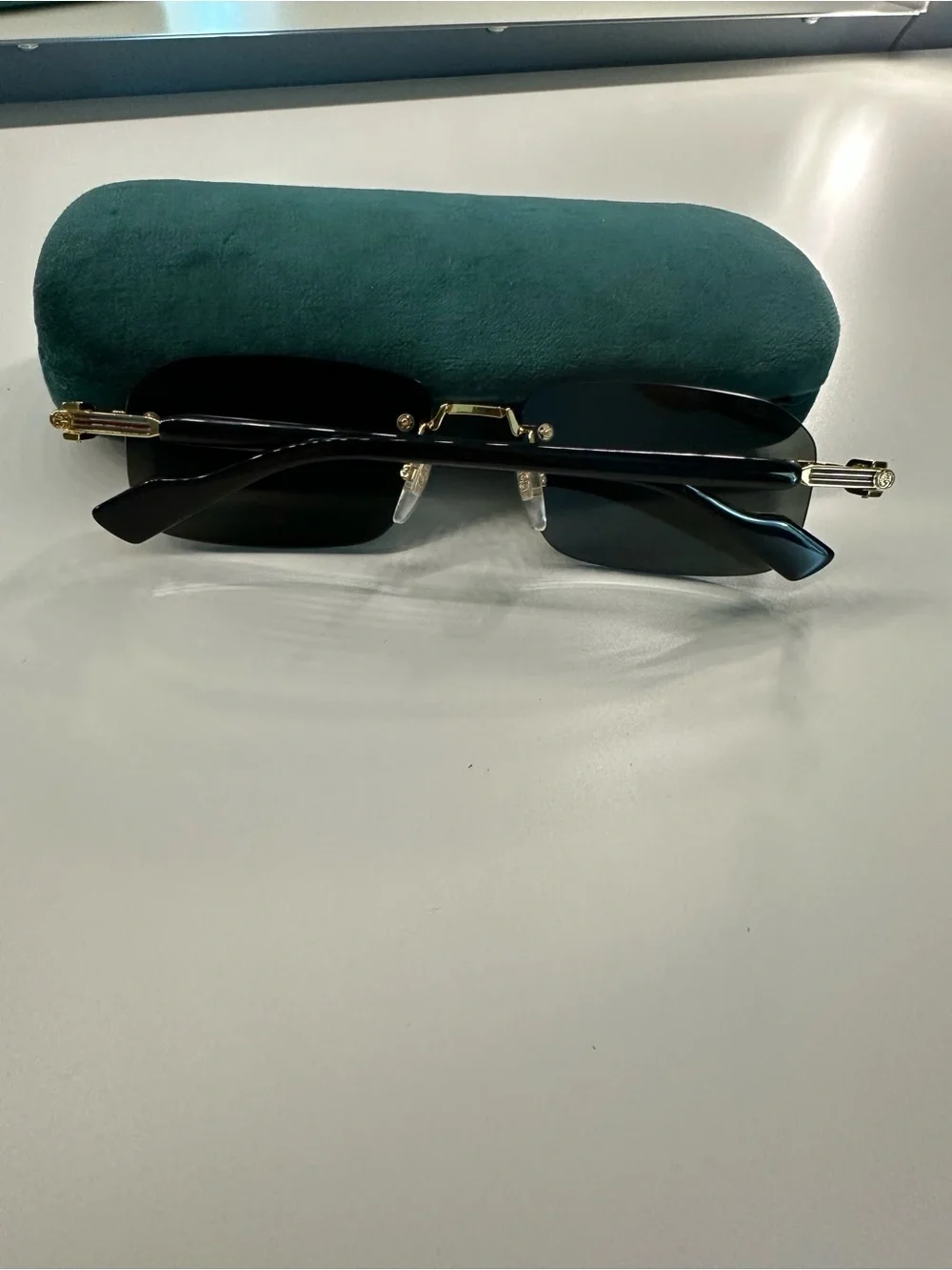 Gucci Men’s Rimless Sunglasses - Black and Gold